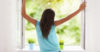 Young woman breathing fresh air during the summer